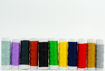 spools of thread isolated on white background