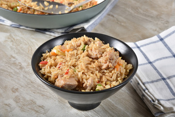A bowl of chicken fried rice
