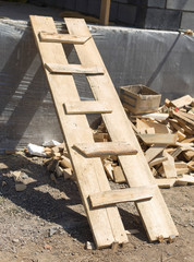 Wooden staircase at the construction site