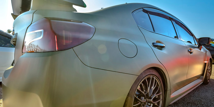 Close Up Of A Polished Silver Car On A Sunny Day