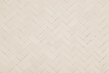 Brown Mat Traditional handicraft bamboo weave texture background. Wicker surface pattern material for wall with antique cracking furniture painted weathered white vintage peeling wallpaper or board.