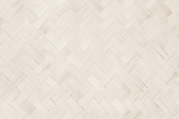 Brown Mat Traditional handicraft bamboo weave texture background. Wicker surface pattern material for wall with antique cracking furniture painted weathered white vintage peeling wallpaper or board.