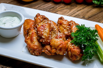 Chicken wings with blue cheese sauce