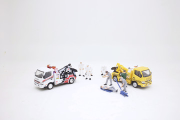 worker figure car repair and tow truck