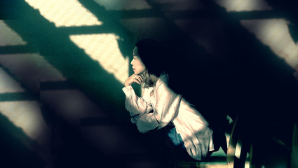 Women sit in ray light