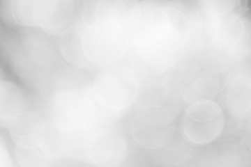 Abstract Bokeh with soft blurred background nature blurry light party in vintage style warm pastel shimmering and faded cool colorful defocused circular. Shiny copy space for holiday card.