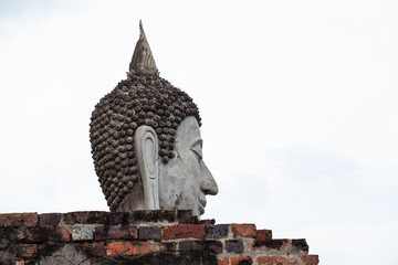The big Buddha appears. But the head from the brick wall was pronounced.