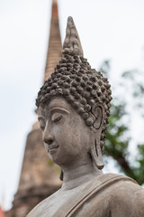 Close up the big Buddha statue in Thailand is a popular tourist destination.
