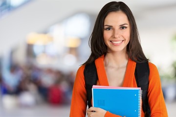 Young Female College Student in Library.