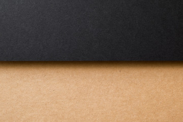Fototapeta premium Kraft paper sheet overlap with brown and black colors for background, banner, presentation template.