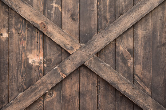 Old wood plank texture with criss cross for grunge background