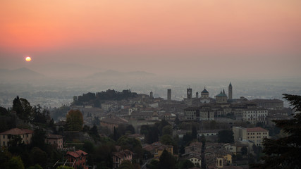 Bergamo. Italy. Drone aerial view of a morning landscape at the old town during fall season