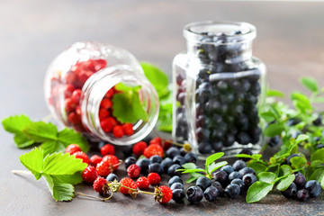 Fresh and healthy forest berries, blueberries and strawberries. Selective focus