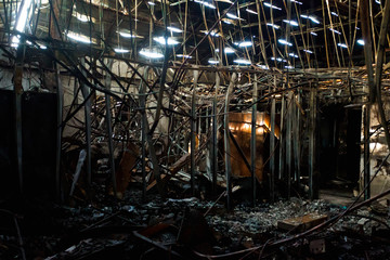 Interior of a factory damaged by fire / Damage caused by fire - Burnt interior