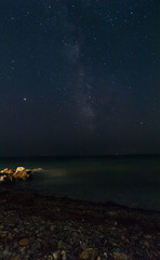 Milky way above coastline near Nea Skioni, Greece