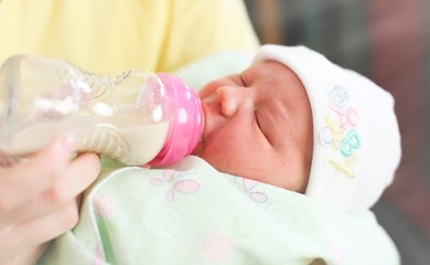 Young mother and newborn baby 