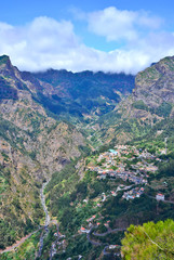 Fototapeta na wymiar Valley of the Nuns, village Curral das Freiras surrounded with mountains, Madeira Island, Portugal