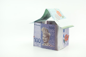 house made of money.Malaysia Ringgit money on white background
