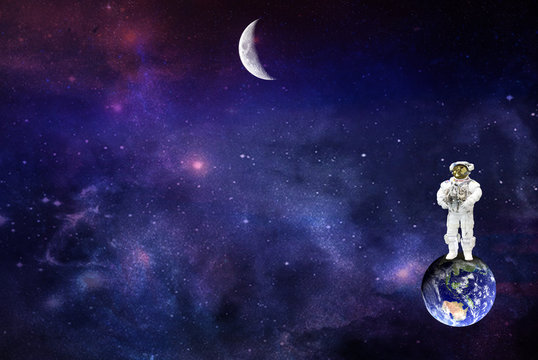 spaceman standing on a planet Earth and peering into the depths of the unexplored moon,elements of this image furnished by NASA