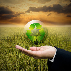 Businessman care recycle  bubble in hand, Sustainable concept