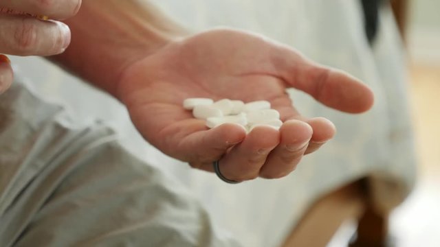 Dolly of a man about to overdose on prescription drugs