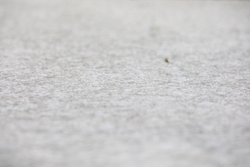 Closeup view on crust of ice over snow