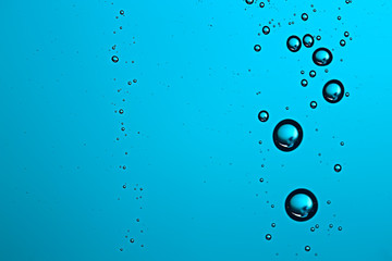 fresh drops background blue glass / wet rainy background, water drops transparent glass blue