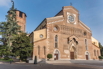 Obraz premium Facade of cathedral with bell tower in Udine, Italy
