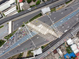 Top view from drone of bangkok, Gate for expressway fee payment Road traffic an important infrastructure in Thailand
