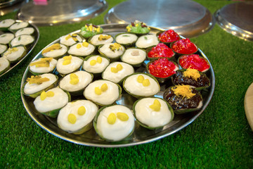 Making of Thai pudding with coconut topping as know as Ta-ko