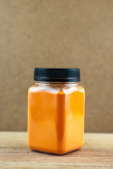 Cheese powder on wooden background