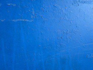 Texture of an old blue painted metallic surface with rust stains for background. Blue paint on...