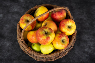 Naklejka na ściany i meble basket with red and yellow apples