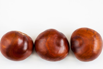 Chestnuts on a white.