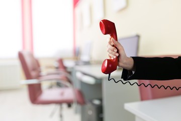 Young business woman using phone