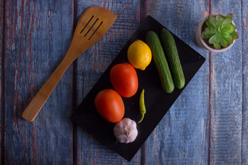 fresh vegetables on wooden table