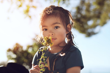 Young Girl with Yellow Flowers