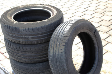 Obraz premium Passenger Car Tires. Old Car Tires