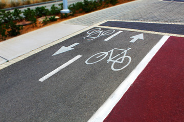 Obraz premium Bike Lane. Bicycle Lane in public park. Bike Lane Pavement Markings