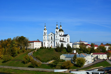 Fototapeta na wymiar Assumption Cathedral of the Assumption on the hill and the monastery of the Holy Spirit on the Western Dvina River. Vitebsk, Belarus