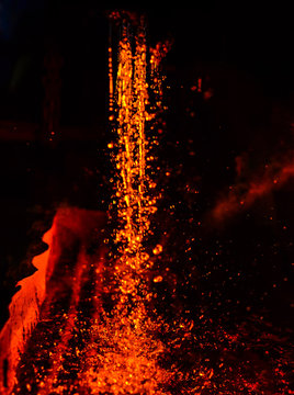 Metal on casting. Metallurgy.  High temperature in the melting furnace. Heavy forging steelmaking plant and steelmaking workshop. Oven. Water curtain. For abstract background and texture.
