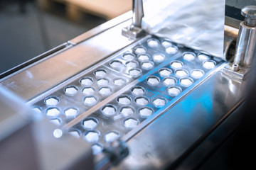 tablet pill production. Blistering conveyer. Blister machine