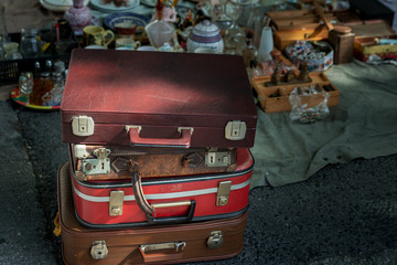 Old and nostalgic suitcases in historical flea market of Lisbon,Portugal.