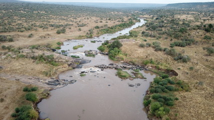 Fototapeta na wymiar Aerial photo African river and savannah wilderness 
