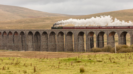 steam train over ribblehead viaduct