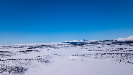 winter landscape with mountains and clear skies