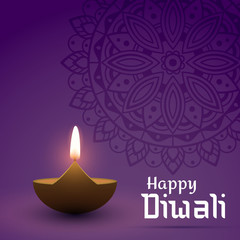 Happy Diwali card with oil lamp and traditional mandala pattern.