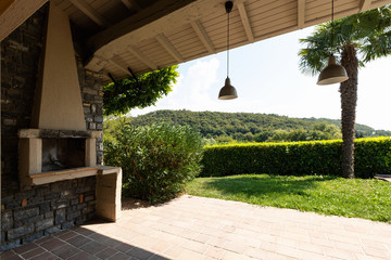 Patio with fireplace of a modern villa