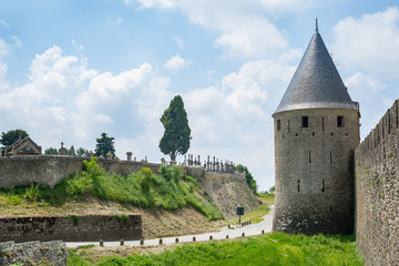 View of the fortress wall and the old cemetery of the medieval city Carcassonne in France © allai