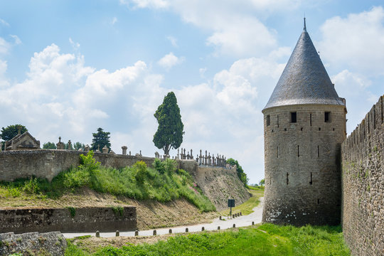 View of the fortress wall and the old cemetery of the medieval city Carcassonne in France